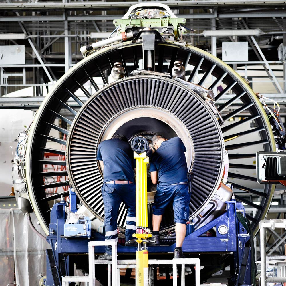 Employees working on turbine